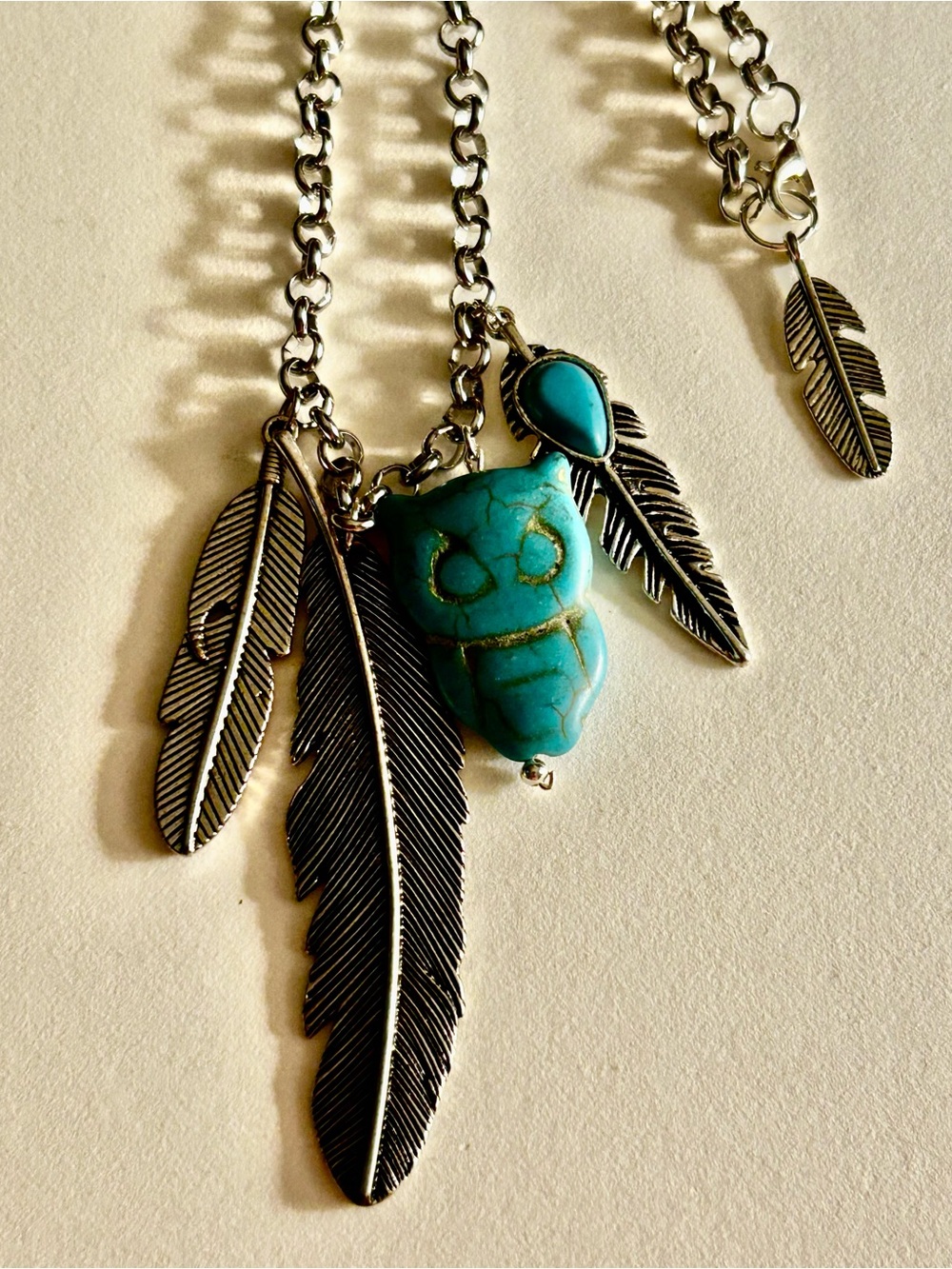 NWOT Charms Necklace: Turquoise Howlite Owl & silver Feather pendants, Rolo link
